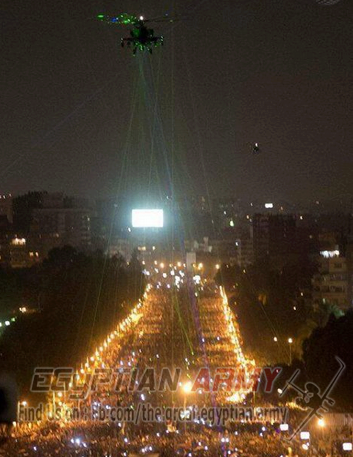 Egyptians within protesting crowd of millions use lasers to blind helicopter pilot